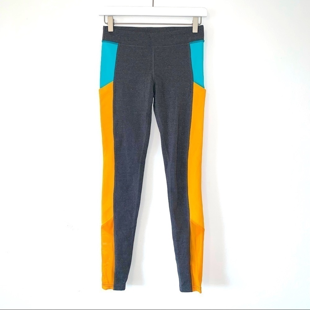 Alo Yoga Ascendant Legging in Colorblock Stormy Heather/Aqua/Flame